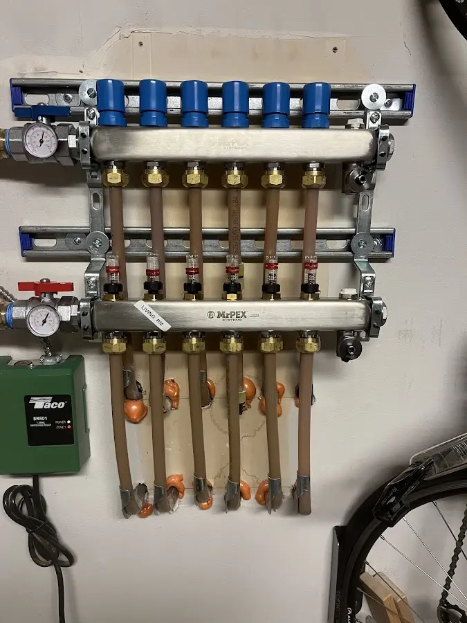 Plumber performing Water Heater Repair at a residential property in Carefree